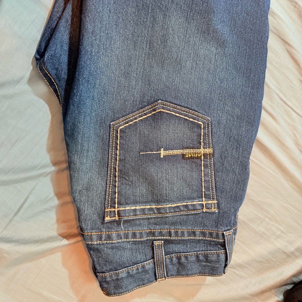 2 PAIRS MENS ARIAT PANTS. 1 work 1 causal